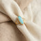 https://cdn.shopify.com/s/files/1/0442/6560/3235/files/boulder-opal-ring-aus-750-gelbgoldhoney-jewelry-3078448.jpg?v=1780031537