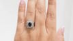 Bague Bague entourage en or blanc, saphir ovale et diamants 58 Facettes 32968