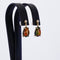 Boucles d'oreilles Boucles d'oreilles en or jaune 14 ct, opales noires GFCO et diamants 58 Facettes E021