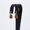 Boucles d'oreilles Boucles d'oreilles en or jaune 14 ct, opales noires GFCO et diamants 58 Facettes E021