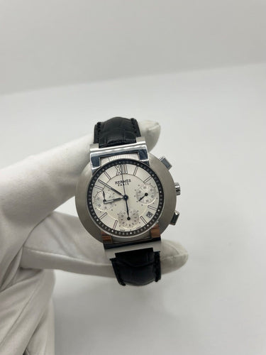 Montre Hermès Nomade - Montre chronographe en acier 58 Facettes 1923