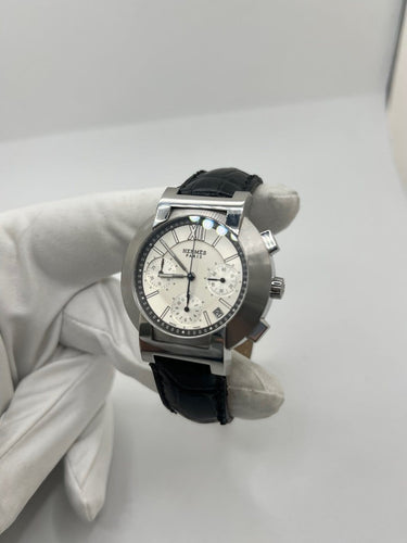 Montre Hermès Nomade - Montre chronographe en acier 58 Facettes 1923