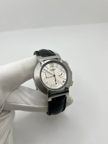 Montre Hermès Nomade - Montre chronographe en acier 58 Facettes 1923