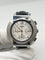 Montre Hermès Nomade - Montre chronographe en acier 58 Facettes 1923
