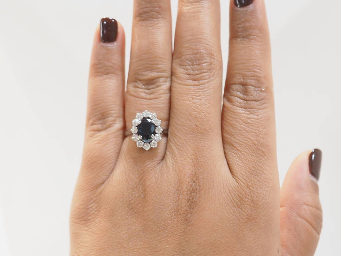 Bague Bague marguerite en or blanc, saphir et diamants 58 Facettes 33209