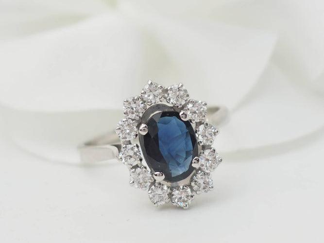 Bague Bague marguerite en or blanc, saphir et diamants 58 Facettes 33209