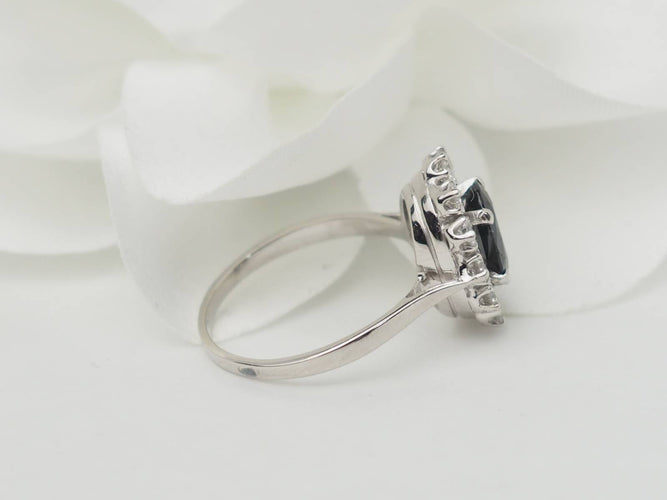 Bague Bague marguerite en or blanc, saphir et diamants 58 Facettes 33209