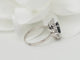 Bague Bague marguerite en or blanc, saphir et diamants 58 Facettes 33209