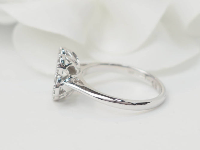 Bague 52 Bague fleur en or blanc et diamants 58 Facettes 21524