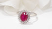Bague Bague marguerite en or blanc, rubis et diamants 58 Facettes 4833