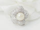 Bague 51 Bague fleur vintage en or blanc 18 carats, perle et diamants 58 Facettes 33405