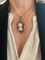 https://cdn.shopify.com/s/files/1/0647/1470/3075/files/Broche_Ancienne_-_Broche_Pendentif_Camee_Agate_Perles_Argent_Or_Jaune_-_Joaillerie_Paris_-_Les_Pierres_de_Julie_2.png?v=1780393628