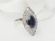 Bague 50 Bague marquise en or blanc, saphir et diamants 58 Facettes 33228