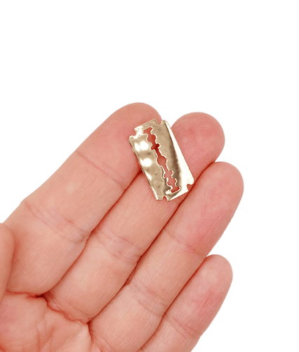 Pendentif Pendentif vintage lame de rasoir en or rose 18k 58 Facettes A07148