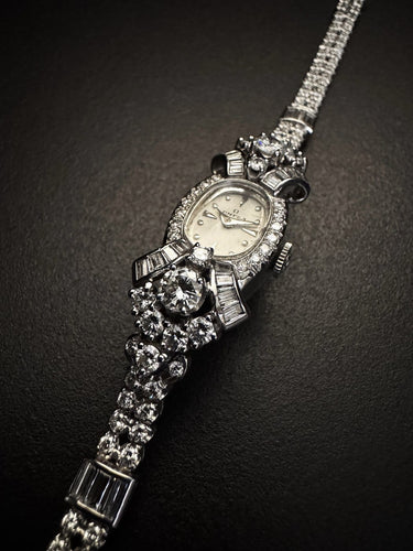 ORL OMEGA CON BRA PLAT  6 CT DIAM  2.jpg