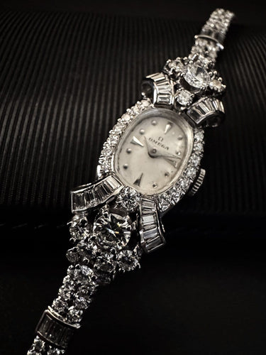 ORL OMEGA CON BRA PLAT  6 CT DIAM  5.jpg