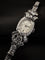 ORL OMEGA CON BRA PLAT  6 CT DIAM  5.jpg
