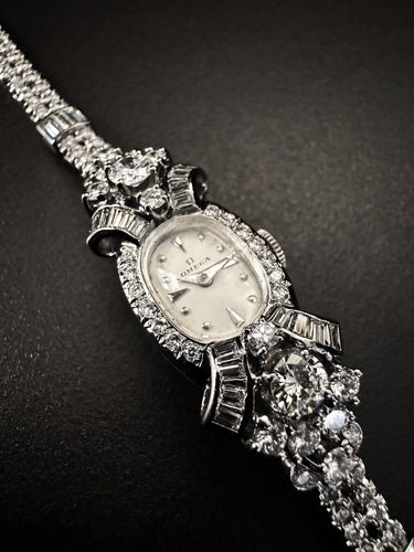 ORL OMEGA CON BRA PLAT  6 CT DIAM  6.jpg