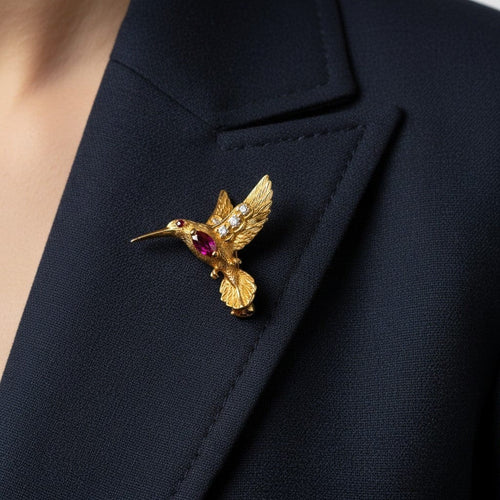 https://cdn.shopify.com/s/files/1/1015/8633/8124/files/e-wolfe-c-vintage-brooch-bird-18k-rubies-diamonds-2.jpg?v=1779466400