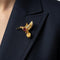 https://cdn.shopify.com/s/files/1/1015/8633/8124/files/e-wolfe-c-vintage-brooch-bird-18k-rubies-diamonds-2.jpg?v=1779466400
