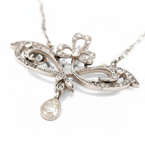 https://cdn.shopify.com/s/files/1/1015/8633/8124/files/antique-jewelry-finds-collier-platinum-diamant-poire-art-nouveau-a1b2c3d4_cbb6ca0c-fabc-4b45-b11d-2468a987de24.jpg?v=1778928940