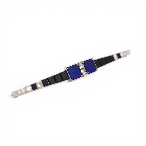 https://cdn.shopify.com/s/files/1/1015/8633/8124/files/antique-art-deco-bar-brooch-diamonds-lapis-onyx-2_fba4acae-a9a5-4bb1-b3f4-1fc9a93a86f3.jpg?v=1779220059