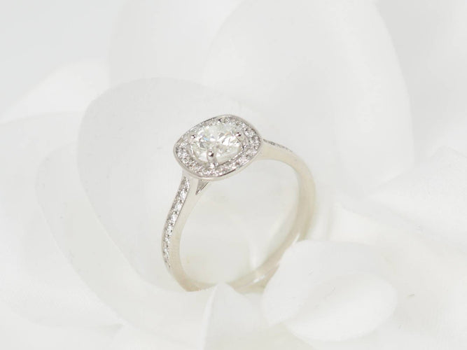 Bague 54 Bague solitaire en or blanc et diamants 0,68 ct 58 Facettes 31790/32624