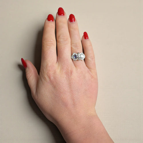 https://cdn.shopify.com/s/files/1/1015/8633/8124/files/art-deco-you-and-me-ring-platinum-diamonds-ceylon-sapphire-cabochon-10.webp?v=1777896025