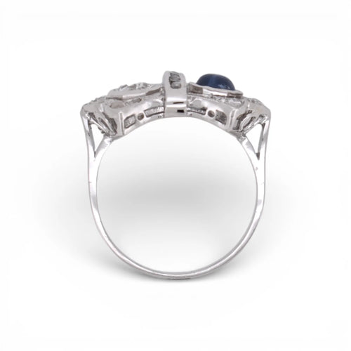 https://cdn.shopify.com/s/files/1/1015/8633/8124/files/art-deco-you-and-me-ring-platinum-diamonds-ceylon-sapphire-cabochon-8.webp?v=1777896024