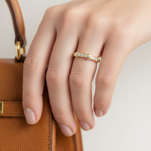 https://cdn.shopify.com/s/files/1/1015/8633/8124/files/cartier-contessa-ring-gold-diamonds.jpg?v=1778322778