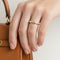 https://cdn.shopify.com/s/files/1/1015/8633/8124/files/cartier-contessa-ring-gold-diamonds.jpg?v=1778322778