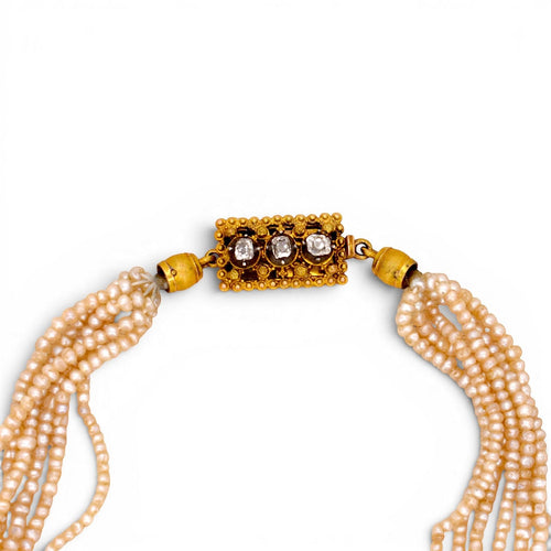 https://cdn.shopify.com/s/files/1/1015/8633/8124/files/antique-necklace-pearl-choker-3.jpg?v=1779355375