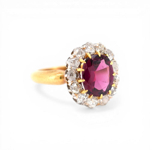 https://cdn.shopify.com/s/files/1/1015/8633/8124/files/antique-victorian-daisy-ring-garnet-diamond-gold-1.jpg?v=1778411882