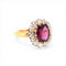 https://cdn.shopify.com/s/files/1/1015/8633/8124/files/antique-victorian-daisy-ring-garnet-diamond-gold-1.jpg?v=1778411882