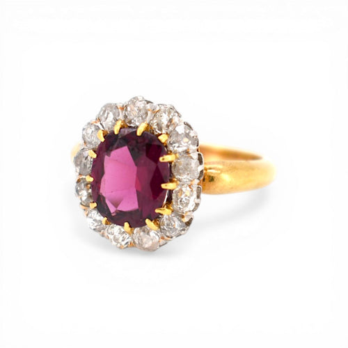 https://cdn.shopify.com/s/files/1/1015/8633/8124/files/antique-victorian-daisy-ring-garnet-diamond-gold-2.jpg?v=1778411881
