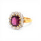 https://cdn.shopify.com/s/files/1/1015/8633/8124/files/antique-victorian-daisy-ring-garnet-diamond-gold-2.jpg?v=1778411881