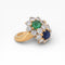 https://cdn.shopify.com/s/files/1/1015/8633/8124/files/you-and-me-ring-emerald-sapphire-diamonds-2.jpg?v=1778755921