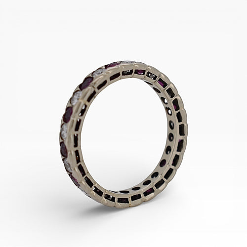 https://cdn.shopify.com/s/files/1/1015/8633/8124/files/eternity-ring-rubies-diamonds-2_10981634-b707-4063-a30b-2aebcb939bf0.jpg?v=1778928624