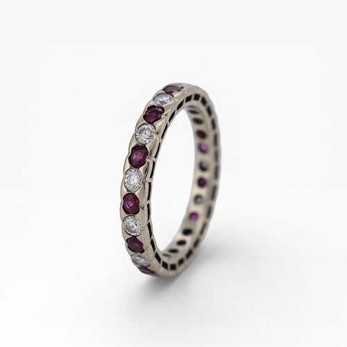 https://cdn.shopify.com/s/files/1/1015/8633/8124/files/antique-jewelry-finds-bague-eternite-rubis-diamants-or-18k-vintage-a1b2c3d4.jpg?v=1778928624