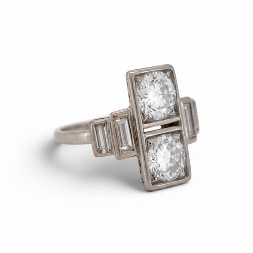 https://cdn.shopify.com/s/files/1/1015/8633/8124/files/art-deco-antique-1920-toi-et-moi-diamonds-ring-2.jpg?v=1779293127