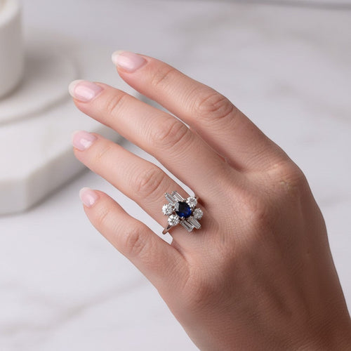 https://cdn.shopify.com/s/files/1/1015/8633/8124/files/vintage-moderniste-cluster-ring-gold-sapphire-diamonds-2_cd8a5756-cca3-4d3e-9bde-2e215348df8e.jpg?v=1779457645