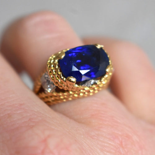 https://cdn.shopify.com/s/files/1/1015/8633/8124/files/vintage-statement-gold-ring-unheated-intense-blue-ceylon-sapphire-diamonds-2.jpg?v=1779463631