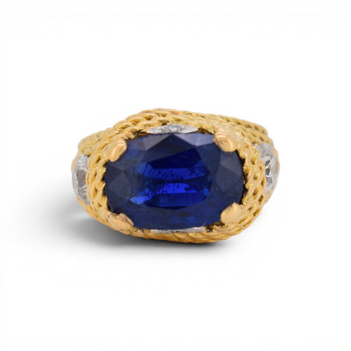 https://cdn.shopify.com/s/files/1/1015/8633/8124/files/vintage-statement-gold-ring-unheated-intense-blue-ceylon-sapphire-diamonds-5.jpg?v=1779463692