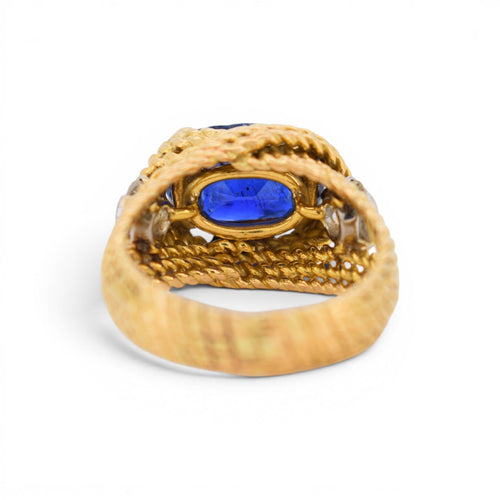 https://cdn.shopify.com/s/files/1/1015/8633/8124/files/vintage-statement-gold-ring-unheated-intense-blue-ceylon-sapphire-diamonds-9.jpg?v=1779463753