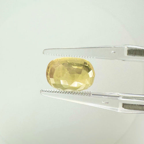 https://cdn.shopify.com/s/files/1/1015/8633/8124/files/no-heat-ceylon-yellow-sapphire-6-10-carat-other-side-profile.jpg?v=1779878731