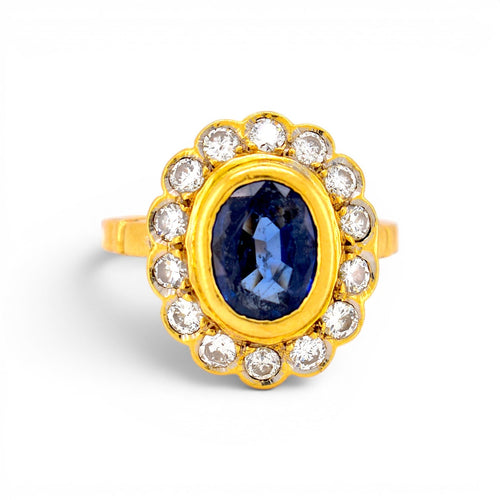 https://cdn.shopify.com/s/files/1/1015/8633/8124/files/vintage-daisy-ring-sapphire-diamonds-gold-18k.jpg?v=1779629426