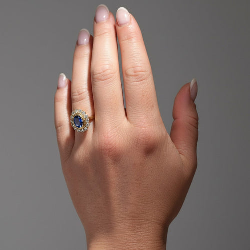 https://cdn.shopify.com/s/files/1/1015/8633/8124/files/vintage-daisy-ring-sapphire-diamonds-gold-18k-1.jpg?v=1779629411