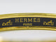 Bracelet Hermès - Bracelet en métal plaqué or et émail 58 Facettes g0dpkzh892