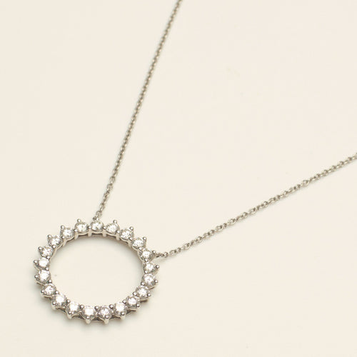 https://cdn.shopify.com/s/files/1/0735/5324/8552/files/tiffany_wg_nckl_circle_dmnds_0036.jpg?v=1780609079