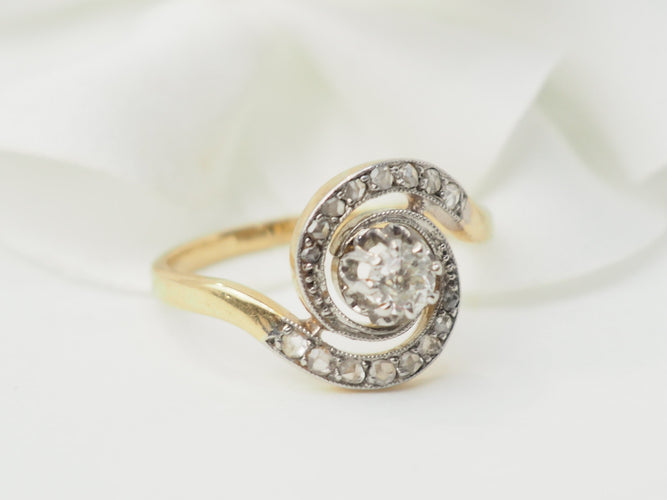 Bague 54.5 Bague tourbillon en or jaune et blanc 18 kt et diamants 58 Facettes 33317